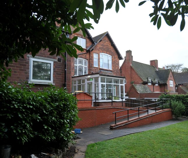 Accessible supported living home with garden ramp entrance and conservatory